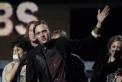 Win Butler of Arcade Fire accepts the Grammy. (AP/Matt Sayles)